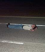 Me lying in the middle of the highway